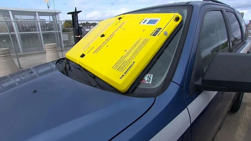 Suction cup device on a car windshield