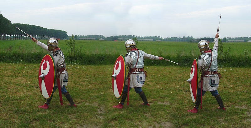 Roman soldier demonstrating plumbata throwing techniques