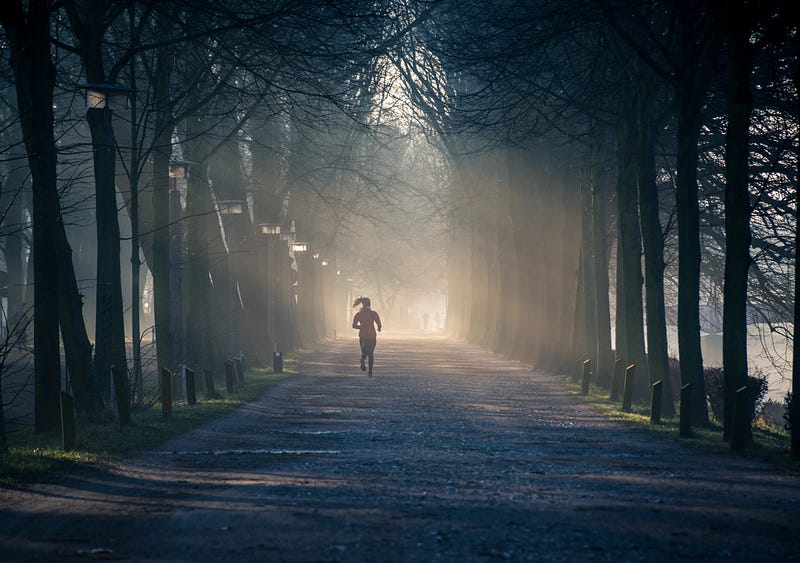 A runner preparing for a morning workout