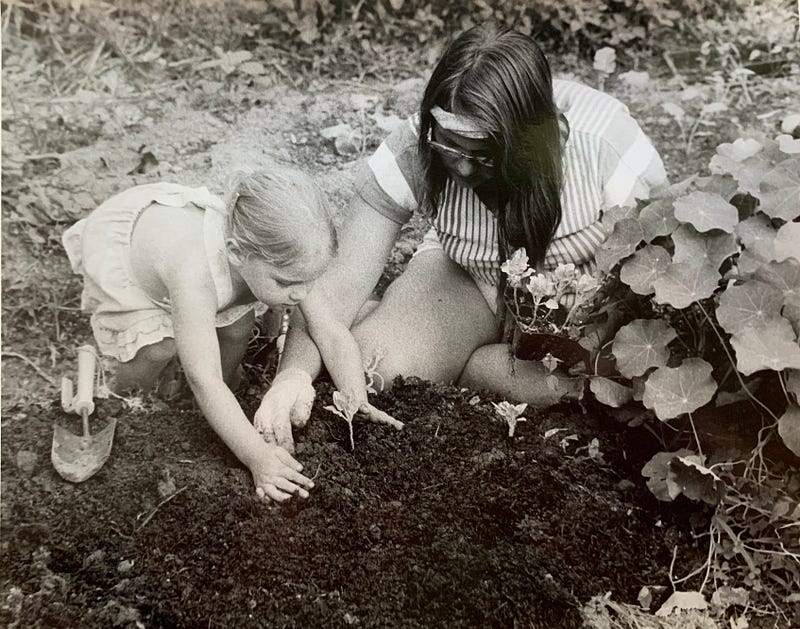 Toddler exploring a garden space